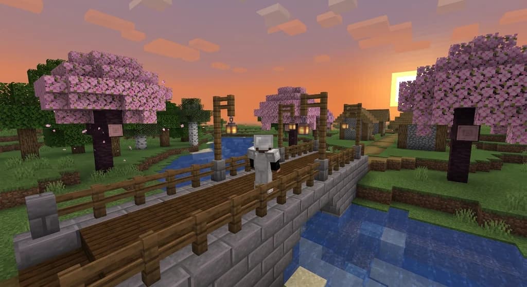 A decorative Minecraft bridge with stone brick and spruce wood palette in a plains biome during sunset