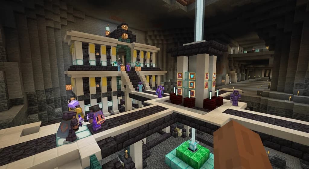 A grand Minecraft server spawn hub with polished blackstone floors, quartz pillars, glowing sea lantern lighting, gold banner rank pedestals, and players in custom armor standing on tiered rank platforms