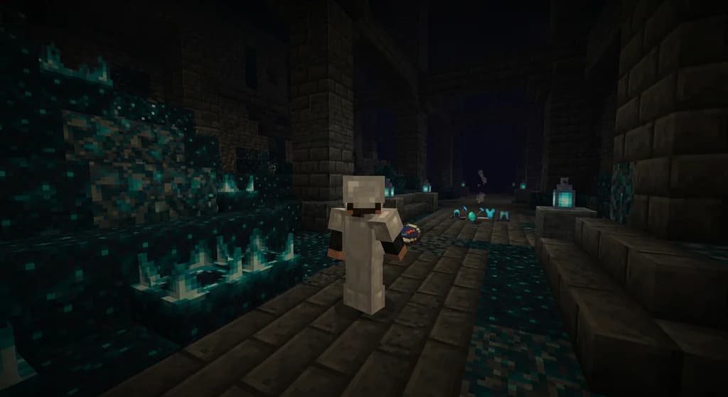 Minecraft player using a recovery compass in an ancient city to find their death location