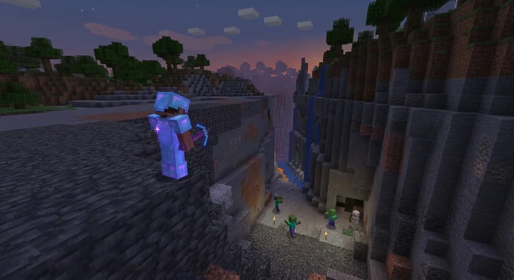 A player in diamond armor on a deepslate cliff overlooking a ravine with hostile mobs at twilight, representing the high stakes of Hardcore mode.