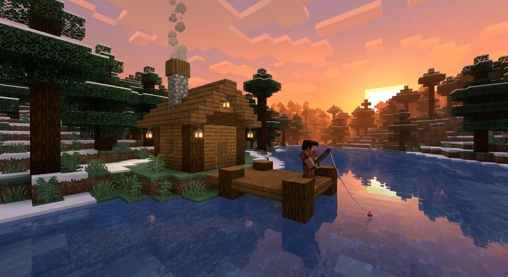 A cozy Minecraft fishing hut on a lakeshore with a wooden dock, campfire smoke, lanterns, and a player fishing at sunset.